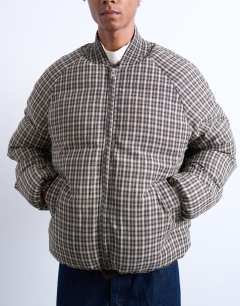 Model wearing Checked puffer in black