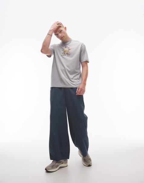 Topman – Ciemnoniebieskie spodnie z szerokimi nogawkami - view 1