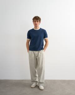 Model wearing Classic cropped fit ringer t-shirt in navy 