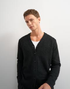 Model wearing Classic fit brushed knitted cardigan in black