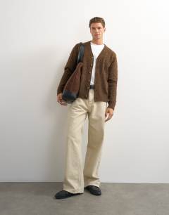 Model wearing Classic fit brushed knitted cardigan in brown