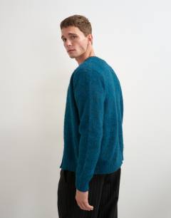 Model wearing Classic fit brushed knitted cardigan in dark teal