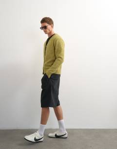 Model wearing Classic fit brushed knitted cardigan in green