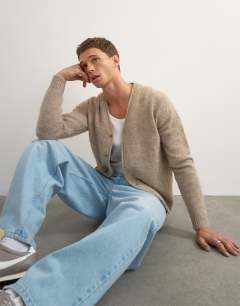 Model wearing Classic fit brushed knitted cardigan in oatmeal