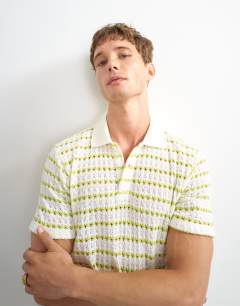 Model wearing Classic fit crochet striped polo in ecru