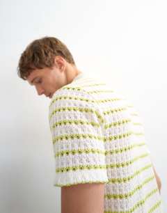 Model wearing Classic fit crochet striped polo in ecru