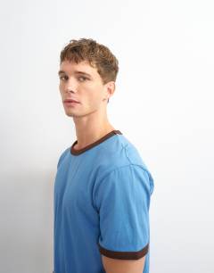 Model wearing Classic fit crop ringer t-shirt in light blue