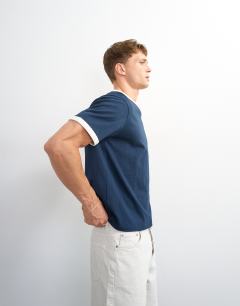 Model wearing Classic fit crop ringer t-shirt in navy
