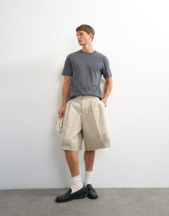 Model wearing Classic fit distressed raw hem t-shirt in charcoal