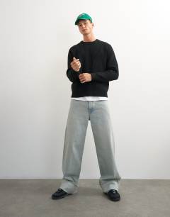 Model wearing Classic fit fisherman knit jumper in black