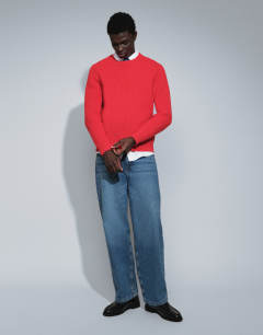 Model wearing Classic fit fisherman knit jumper in red