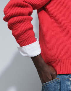 Model wearing Classic fit fisherman knit jumper in red