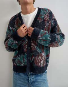 Model wearing Classic fit fluffy floral cardigan in navy