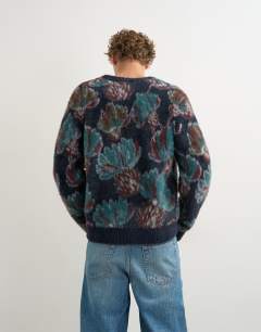 Model wearing Classic fit fluffy floral cardigan in navy