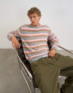 Model wearing Classic fit fluffy jumper with stripe in pink