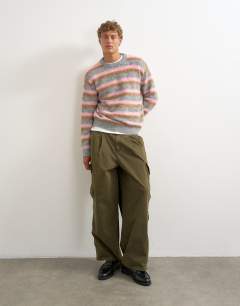 Model wearing Classic fit fluffy jumper with stripe in pink