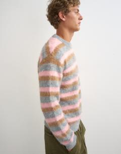 Model wearing Classic fit fluffy jumper with stripe in pink