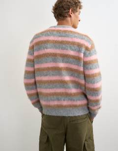 Model wearing Classic fit fluffy jumper with stripe in pink