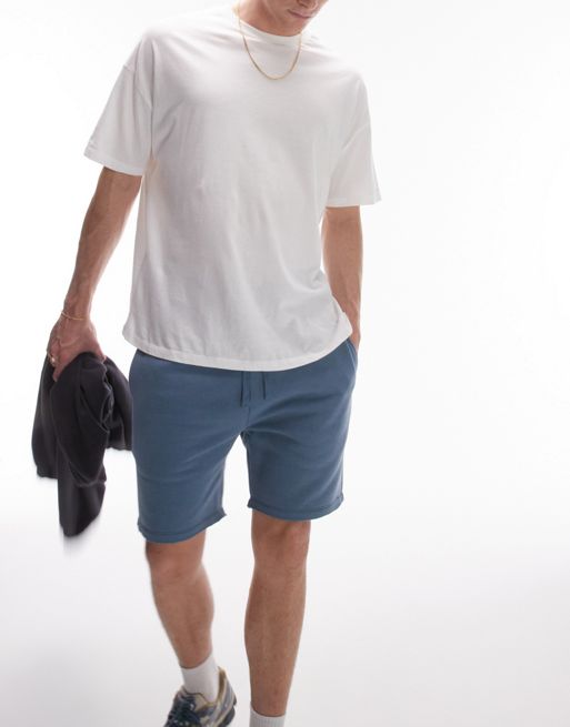Topman classic fit jersey short with raw hem in blue