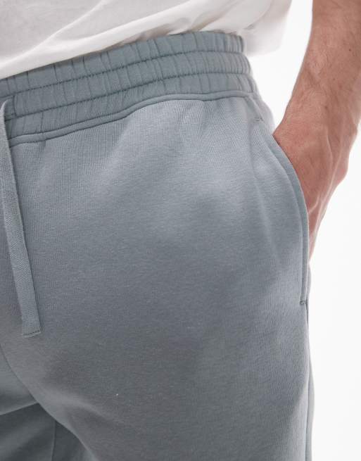 Topman classic fit jersey shorts with raw hem in sage, 5 of 5