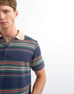 Model wearing Classic fit jersey stripe polo in navy