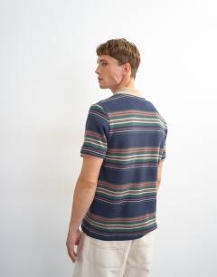 Model wearing Classic fit jersey stripe polo in navy