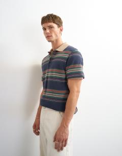 Model wearing Classic fit jersey stripe polo in navy