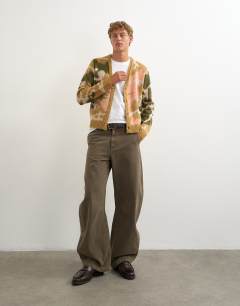 Model wearing Classic fit knit cardigan with abstract camo design in stone