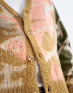 Model wearing Classic fit knit cardigan with abstract camo design in stone