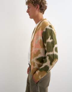 Model wearing Classic fit knit cardigan with abstract camo design in stone