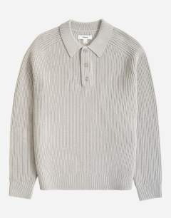 Model wearing Classic fit knitted polo in grey