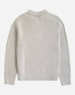Model wearing Classic fit knitted polo in grey