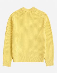 Model wearing Classic fit knitted polo in yellow