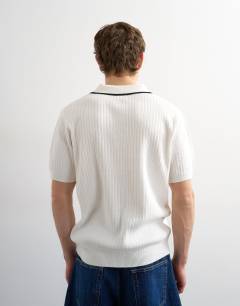 Model wearing Classic fit knitted rib polo with tipping in ecru