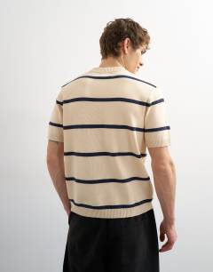 Model wearing Classic fit knitted stripe t-shirt with stripe in cream
