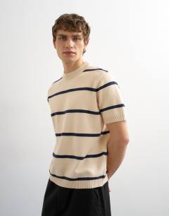 Model wearing Classic fit knitted stripe t-shirt with stripe in cream