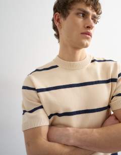Model wearing Classic fit knitted stripe t-shirt with stripe in cream