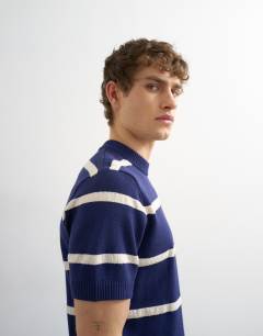 Model wearing Classic fit knitted stripe t-shirt with stripe in navy