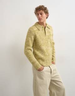 Model wearing Classic fit knitted twist polo in light green