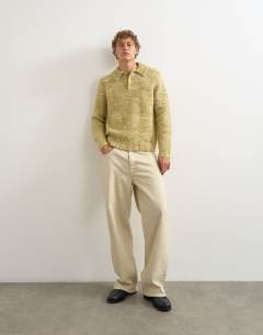 Model wearing Classic fit knitted twist polo in light green
