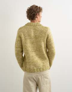 Model wearing Classic fit knitted twist polo in light green