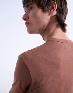 Model wearing Classic fit lightweight t-shirt in brown