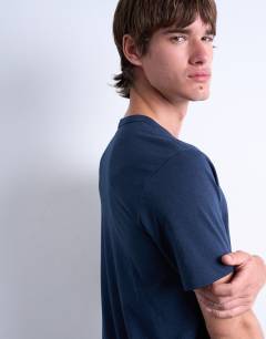 Model wearing Classic fit lightweight t-shirt in navy