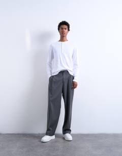 Model wearing Classic fit long sleeve rib henley t-shirt in white