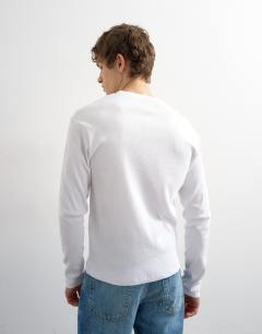 Model wearing Classic fit long sleeve rib henley t-shirt in white