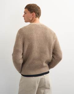 Model wearing Classic fit plaited fisherman knit jumper in oatmeal