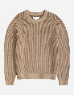 Model wearing Classic fit plaited fisherman knit jumper in oatmeal