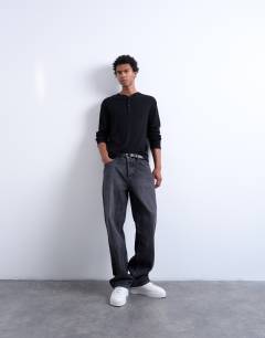 Model wearing Classic fit rib long sleeve henley t-shirt in black