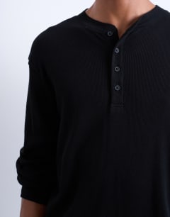 Model wearing Classic fit rib long sleeve henley t-shirt in black