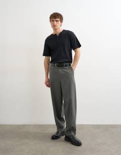 Model wearing Classic fit ribbed henley t-shirt in black